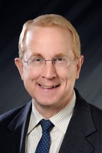 James E. Hughes, Esq.
