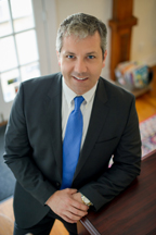 Romin N. Currier, Esq.