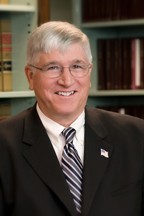 Lewis G. Brewer, J.D., LL.M.